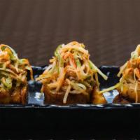 Nippon Antojitos · Crispy Shrimp, Sweet Plantain, Neptuno salad, Spicy Mayo, Eel Sauce.