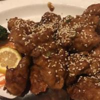 General Tso'S Chicken · The generals favorite dish. Tender chunks of boneless chicken marinated in a garlic sauce, l...