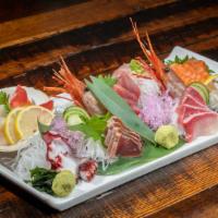 Sashimi Deluxe · Nine kinds chef's choice sashimi assortment. For 3-4 people. Always include Tuna, fresh salm...