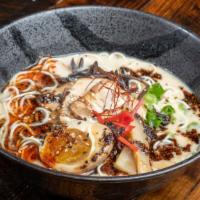 Tonkotusu Ramen · Creamy pork, and vegetable broth with premium white soy sauce. Topped with  house chashu por...