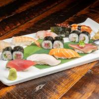 Ginya Sushi Deluxe · Chef's choice 10 pieces nigiri sushi with either spicy tuna or tuna roll
