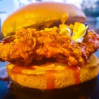Hot Honey Fried Chicken Sandwich Plate · Buttermilk marinated chicken breast fried golden brown tossed in a sweet and spicy honey sau...