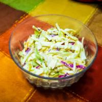 Coleslaw · Sweet & tangy mixed cabbage and carrot.