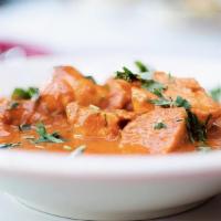 Chicken Tikka Masala · Charcoal roasted chicken cubes in a moderately spiced cream sauce.