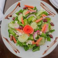 Greek Salad · Vegetarian.Lettuce, Tomatoes, Feta, Cucumbers, Red Onions, Kalamata Olives, Greek dressing