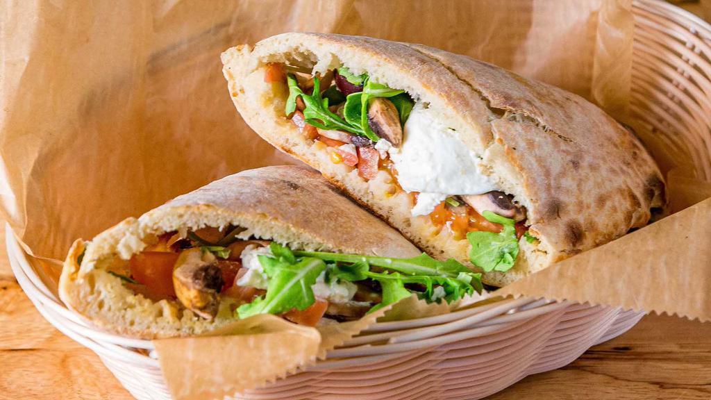 Vegetarian Sandwich · Arugula, cherry tomatoes, burrata, mushrooms and olives