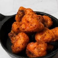 Spicy Fried Cauliflower (6 Oz) · Serving of batter fried cauliflower with spicy seasoning served with ranch dressing.