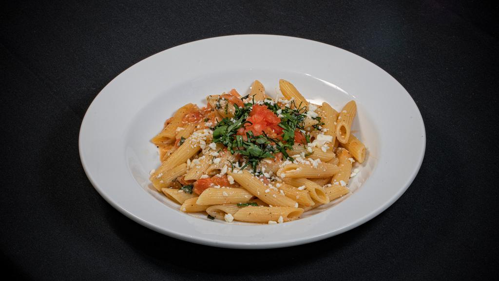 Mediterranean Pasta · Vegetarian. Fresh tomatoes, garlic, basil, sautéed with olive oil then tossed with penne pasta, parmesan and feta cheese.