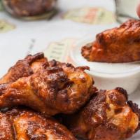 Oven Baked Wings A La Carte · Our wings are baked and crisped up in our oven and finished with your choice of sauce: Naked...