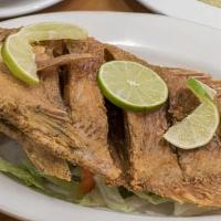 Mojarra Frita / Fried Mojarra · With Rice, Beans, Salad and Fried Green Plantains