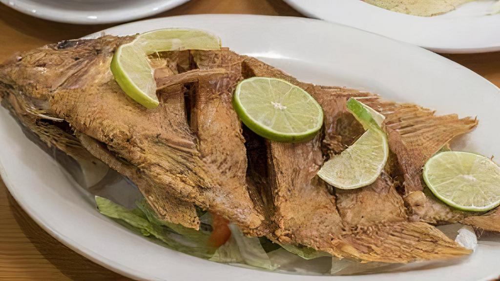 Mojarra Frita / Fried Mojarra · With Rice, Beans, Salad and Fried Green Plantains