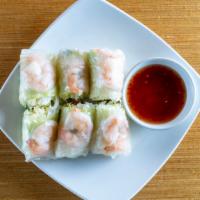 Summer Rolls · Shrimp, lettuce basil leaves, carrots and rice vermicelli wrapped in rike paper and served i...