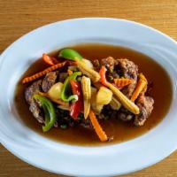 Crispy Duck Darling · Half crispy duck topped with carrots, pineapples, sweet peas, baby corn, scallions and bell ...