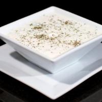 Masto-Khiar (Yogurt And Cucumber Dices) · Dry mint mixed in yogurt