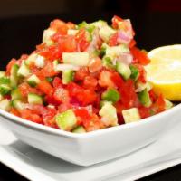 Salad Shirazi · Cucumbers, tomatoes, onions, lemon juice & virgin olive oil