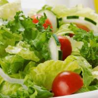 Green Salad · Romaine lettuce topped with onions, tomato & cucumber. Served with a creamy homemade Persian...