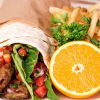 Kobideh Sandwich · Combination of beef and lamb served on pita bread with tomato, onion, lettuce and yogurt sauce