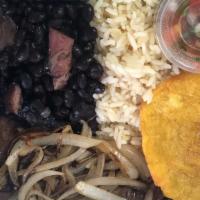 Churrasco · With rice and beans and one plantain.
