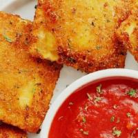 Fried Ravioli  · These are pretty big. You get 6 fried four cheese Ravioli and marinara sauce for dipping!
Th...