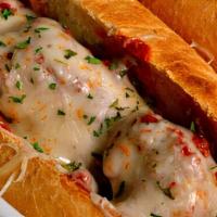 Meatball Sub · Locally baked sub filled with our homemade meat sauce, meatballs and melted provolone cheese...