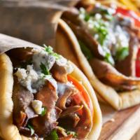 Authentic Gyro · Beef or Lamb combination and Come with lettuce, Tomato, and house made Tzatziki  sauce with ...
