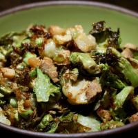 Brussels · Gluten-Free and Dairy Free. Sprout Leaves, Caramelized Onion, Ginger, Smoked Bacon, and Chil...