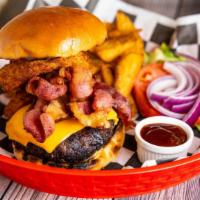 Extreme Burger · With extra cheddar cheese, onion rings, and crispy bacon.