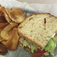 Homemade Tuna Salad Sandwich · Served with lettuce and tomato