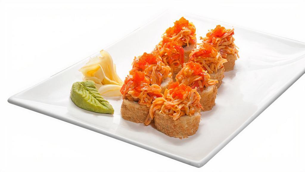 Rock N' Roll · Spicy. Spicy salmon with cream cheese, flash-fried and topped with spicy crabmeat and yum yum sauce.