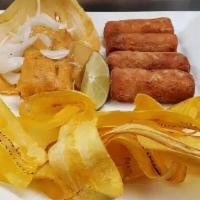 Combo Criollo · 4 ham croquettes, one cuban tamal and mariquitas.