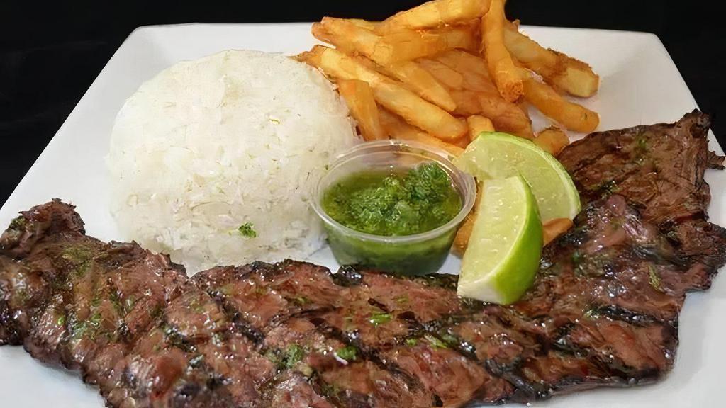 Baby Churrasco · Juicy tender charbroiled skirt steak served with chimichurri sauce with a choice of 2 sides.