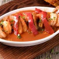 Camarones Enchilados · Creole shrimp with a tomato based sauce.