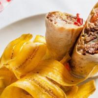 Cuban Wrap · With grilled onions, black bean puree and diced maduros, fresh lettuce and tomato dressed wi...