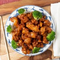General Tso’S Chicken · Tender and crispy chicken chunks with spicy glazed sauce served with steamed broccoli at the...