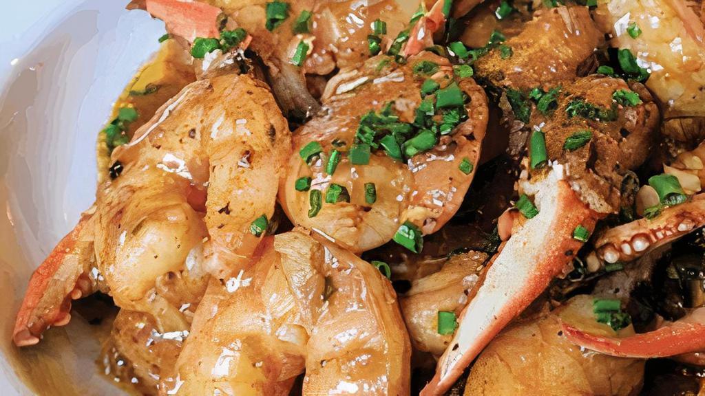 Blue Crab Claws & Shrimp · Shrimp and crab, sauteed in our Cajun butter sauce