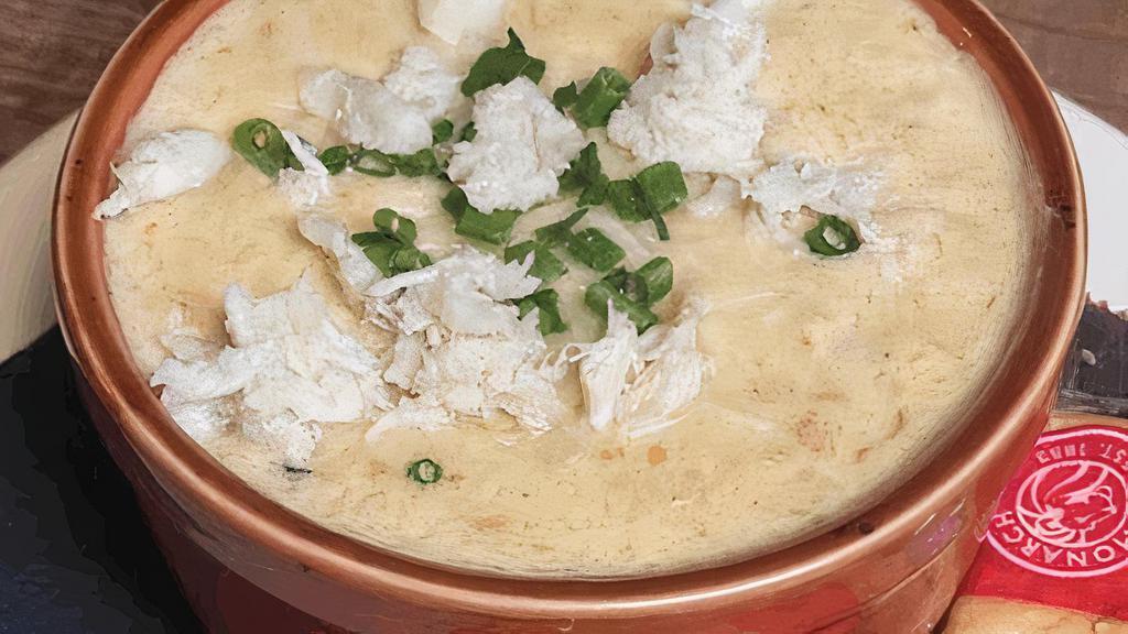 She Crab Soup (Cup) · Sherry based, creamy she crab topped with fresh chives.