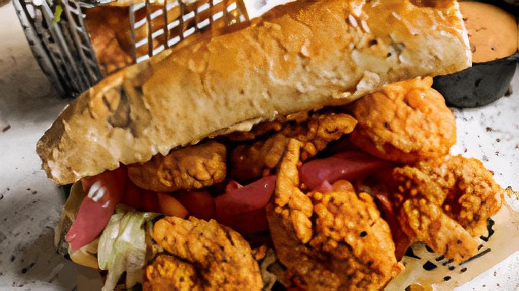 Shrimp Po Boy · Fried shrimp iceberg lettuce, diced tomatoes, pickled onions and a drizzle of homemade remoulade sauce.Served with homemade potato chips.