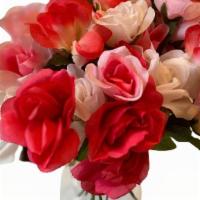   Puckering Roses - Silk · 20-25 blooms in a vase. 

*add up to 20 characters for a message.
add any special instructio...