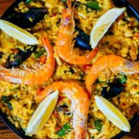 Paella De Pescado Y Marisco Con Langostino · Paella Seafood