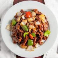 Pepper Steak With Onion · With white rice.