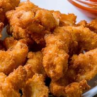 Chicken Fingers · Breaded or battered crispy chicken. your choice of flavor.