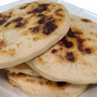 Pupusas · A delicious flatbread stuffed with Cheese only Or with Cheese & Pork  also Cheese & Chicken ...