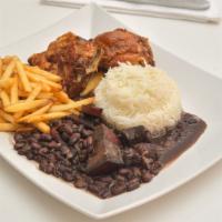 Chicken Leg Quarter · Tender, juicy roasted chicken leg quarters served with rice, beans, and fries.