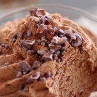 Belgian Chocolate Mousse · A creamy belgian chocolate mousse topped with chocolate sprinkles