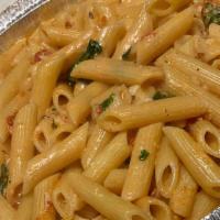 Penne Alla Vodka · Perfectly cooked penne pasta in our homemade marinara vodka cream sauce.