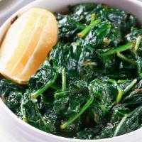 Wild Greens · steamed baby spinach, chard, lemon vinaigrette