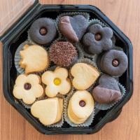 Leon Special Cookies · doubled filled chocolate, vanilla, raspberry, and apricot fillings. 1 piece.