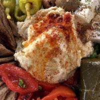 Greek Plate & Pita (For Two) · Vegetarian. Homemade tahini hummus, feta, grape leaves, calamata olives, roasted red peppers...