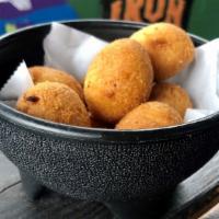Hush Puppies · Southern style hush puppies with creole mayo side.