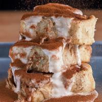 Cinnamon Rolls · Moist yeast rolls slathered with butter cinnamon and brown sugar finished with creamy frosti...